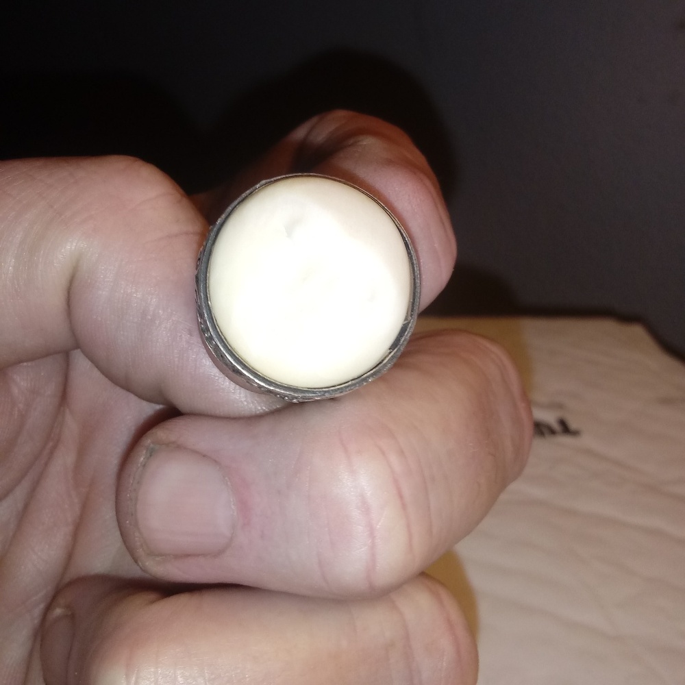 Sterling silver ring with carved bone face!